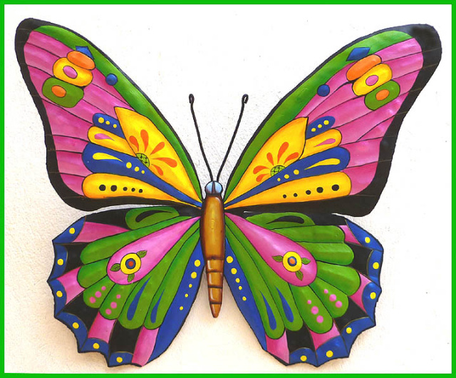 Hand painted metal butterfly wall art.